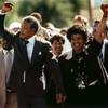 Photo: Nelson Mandela and wife Winnie, walking hand in ha Photo: Nelson Mandela and wife Winnie, walking hand in ha