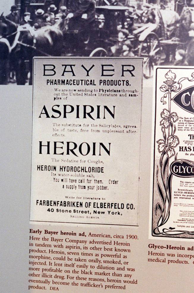 This May 1999 file photo provided by the DEA shows a circa 1900 Bayer aspirin advertisement featuring heroin as an ingredient, part of an exhibit at the new Drug Enforcement Administration Museum and Visitors Center in Arlington, Va. Heroin marketed by the Bayer Company in 1898 as the "wonder drug" of the arriving 20th century, sold as a cure for the wracking cough caused by tuberculosis.