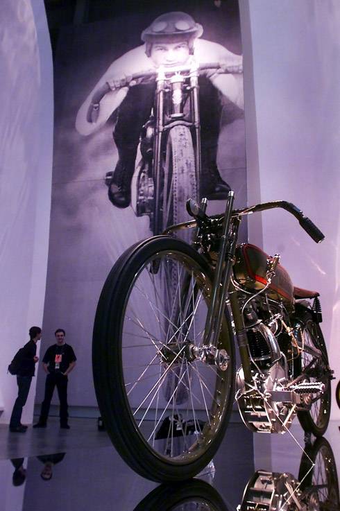 Invited guests look over a 1923 Harley Davidson 8-valve Board Track Racer motorcycle during a preview of the Guggenheim Las Vegas museum at The Venetian hotel-casino Thursday, October 4, 2001. The inaugural exhibit at the new museum is "The Art of the Motorcycle". The 63, 700 sq. ft. exhibition hall opens to the public Sunday.