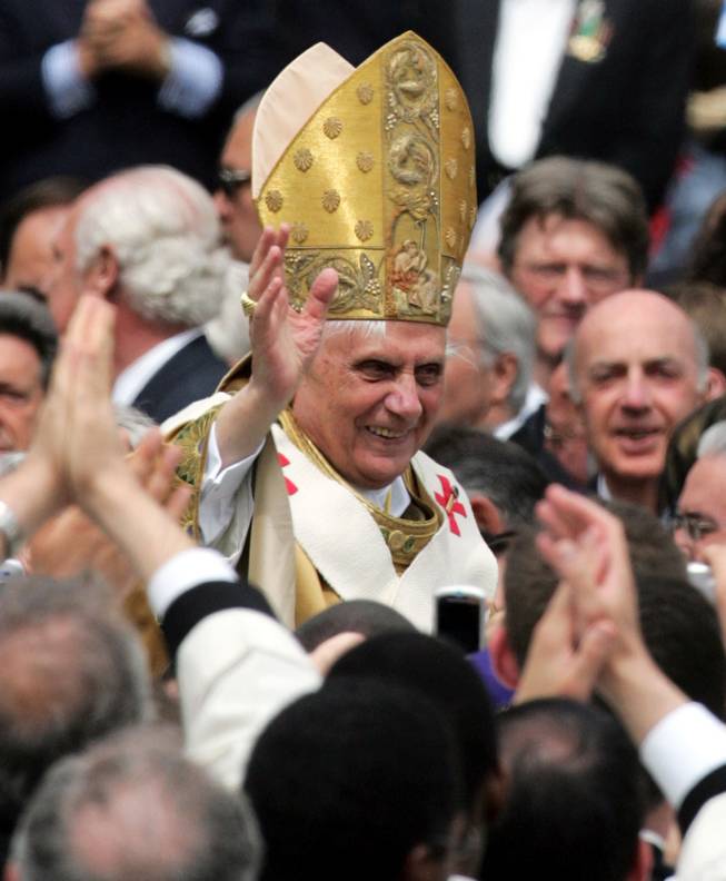 In this Sunday, Sunday, April 24, 2005, file photo, Pope Benedict XVI waves as he rides on the Popemobile through St. Peter's Square at the Vatican, following his installment Mass. Pope Benedict XVI announced Monday, Feb. 11, 2013, he would resign Feb. 28 because he is simply too old to carry on.