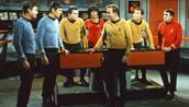 In this undated photograph released by Paramount Pictures, the cast of the original "Star Trek" television series and movies are seen from left: DeForest Kelley, Leonard Nimoy, Walter Koenig, Nichelle Nichols, William Shatner, George Takei and Jimmy Doohan.