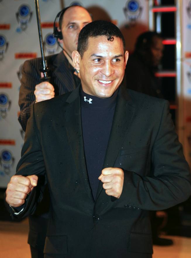 FILE - In this Dec. 14, 2006, file photo, boxer Hector "Macho" Camacho of Puerto Rico arrives for the Premios Fox Sports at the Jackie Gleason Theater in Miami Beach, Fla. Camacho's life and career have taken more turns than a pulp novel, from the gritty streets of Spanish Harlem to the bright lights of the Golden Gloves, from walking between the bars of a jail cell to stepping between the ropes of the ring.