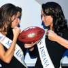 Miss Louisiana Katherine Putnam and Miss Indiana Nicole Pollard pose for photos with an official Super Bowl XLIV game ball at Planet Hollywood on Jan. 25, 2010.