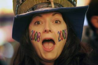 Laura Mason of Salt Lake City, Utah celebrates New Year's Eve at the Fremont Street Experience in downtown Las Vegas December 31, 2007. 