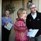 Photo: Rory and Cindy Reid turn to greet Peggy Ganopole�