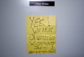 A sign hangs on the outside door of Culinary Union Local 226 political director Pilar Weiss after a caucus day rally and informational meeting at the Culinary Union Local 226 headquarters in Las Vegas early in the morning Saturday, January 19, 2008. 
