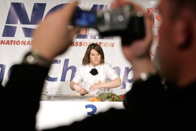 Angie Fitzgerald of Fareway Stores competes for the state of Nebraska during the preliminary round of the USA "Best Bagger" Championship, presented by the National Grocers Association at Bally's Las Vegas Wednesday, Feb. 6, 2008.