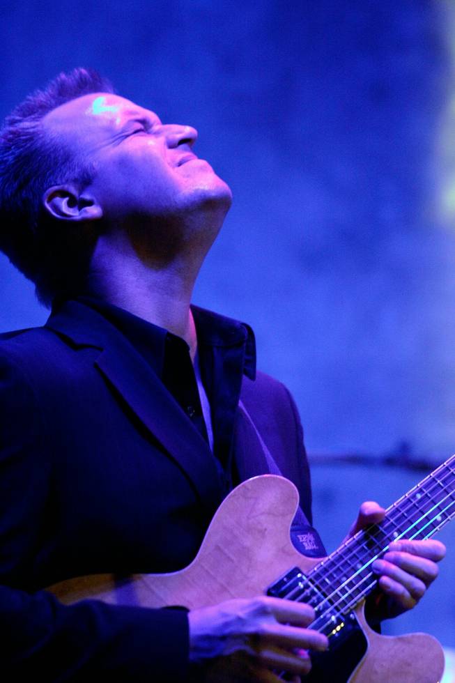 Band leader John Wedemeyer plays the guitar with The Other Guys.