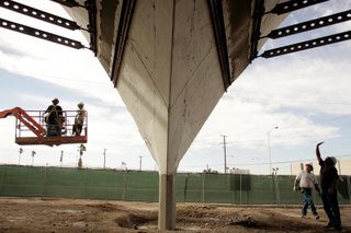 Workers from Dean Concrete work on the structure of the La Concha Motel lobby in downtown Las Vegas. The La Concha will serve as the entry and gift shop for the Neon Museum.