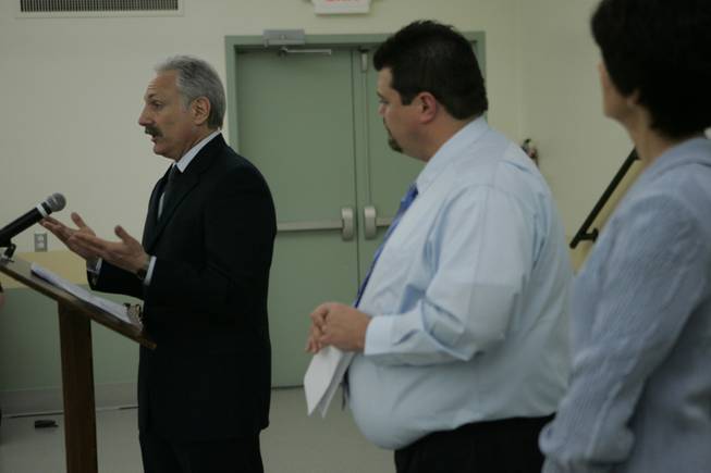 Dr. Lawrence Sands, left, Southern Nevada Health District (SNHD) chief health officer, speaks as Brian Labus, center, SNHD senior epidemiologist, and Lisa Jones, bureau chief for the Nevada State Health Division's Bureau of Licensure and Certification, look on during a news conference at the health district Wednesday, February 27, 2008. The health district is notifying about 40,000 former patients of the Endoscopy Center of Southern Nevada that they may have been exposed to hepatitis C.