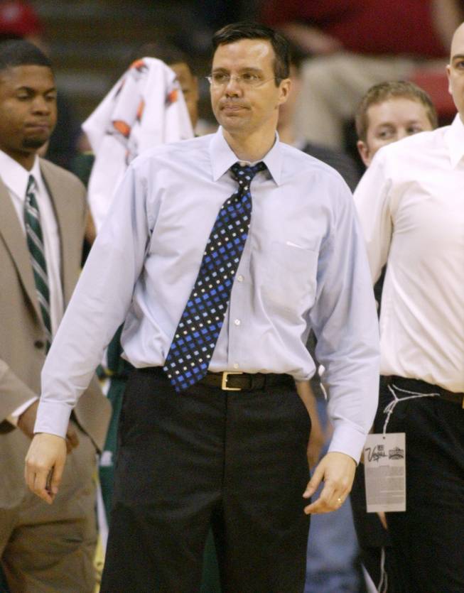 Colorado State head coach Tim Miles takes to the court for a time out during their game against BYU Thursday, March 13, 2008.  
