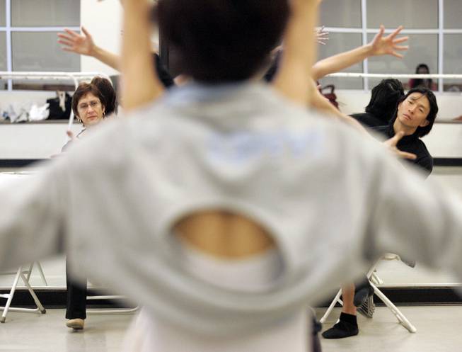 Dancers from the Seoul Ballet Theatre, foreground, rehearse in Summerlin as Nevada Ballet Theatre ballet mistress Clarice Rathers, left rear, and principal dancer Kyudong Kwak watch. Eight dancers from each company will be featured in the repertory program.