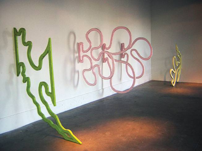 Sculptures in the Patrick Nickell exhibit "Expansionism" at Dust Gallery are crudely 
finished, whimsical, cartoonish lines that reconfigure space.