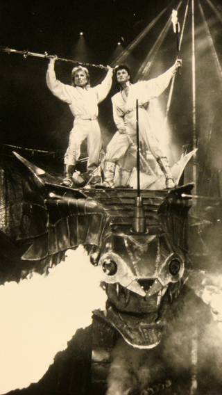 Siegfried and Roy battle a fire-breathing dragon during a performance of their show at the Mirage Hotel's Siegfried and Roy Theater.