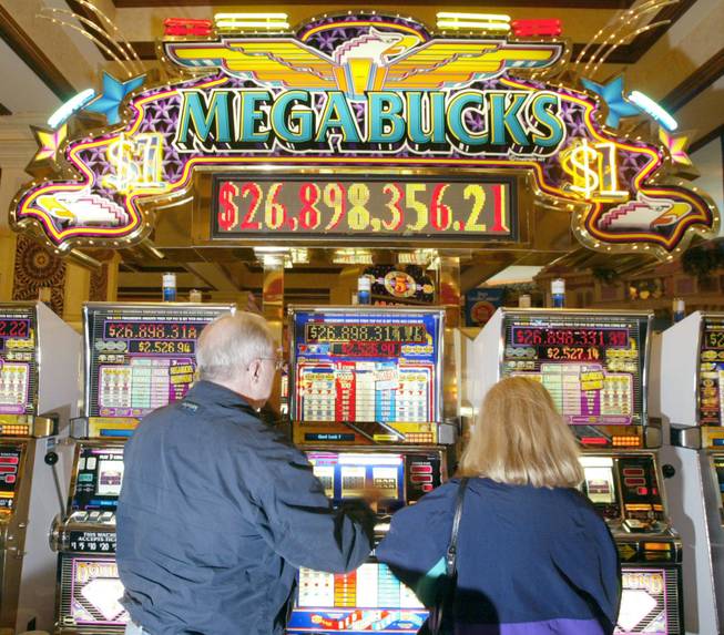 Dan Healy and his wife Margaret Healy try their hand at winning Megabucks at Sunset Station. Megabucks is a progressive dollar slot machine, which means that the more money people put in, the bigger the jackpot gets. Jackpots hit have ranged from $7 million to $39 million.