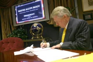 Libertarian Party candidate for president, Wayne Allyn Root, prepares to tape campaign video e-mail messages. 