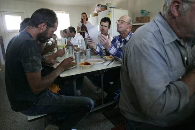 Dean Baker, 69, sits down to a meal with his ranch hands. In 2007 Baker took a spot on a team from Millard County, Utah, determined to have a say in how Snake Valley's water is divided.