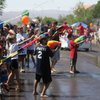 Photo: The water fight portion of the Damboree Parade is Photo: The water fight portion of the Damboree Parade is