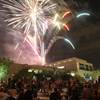 Photo: Spectators look on as a fireworks explode during H Photo: Spectators look on as a fireworks explode during H
