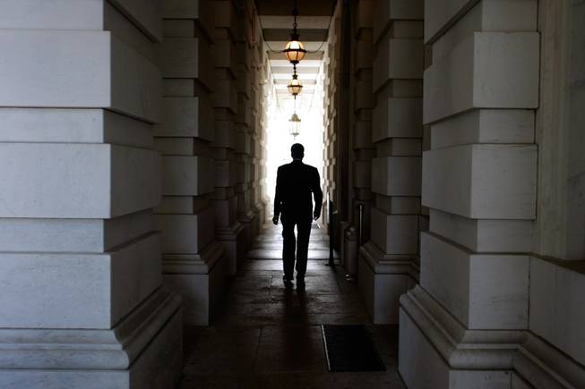 Sen. John Ensign, R-Nev. walks into  the U.S. Capitol in Washington, D.C. Ensign achieved national prominence for single-handedly holding up the housing relief package late last month.