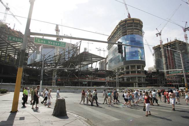 The CityCenter construction site, where six workers have died, looms above Harmon Street and Las Vegas Boulevard on July 10.