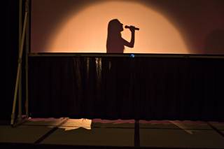 A Cher impersonator takes center stage at the Cher convention during the one-day event at Caesars Palace on Tuesday.