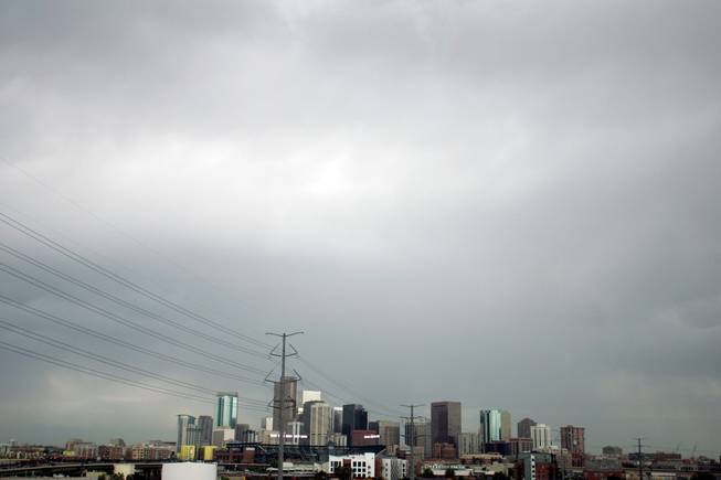 When we arrived in Denver Saturday afternoon, I couldn't help but notice the rain clouds looming over downtown. This reminded me of the photo I took of the skyline of Las Vegas the day we left on this road trip Aug. 12. Another thought was, what if Barack Obama's speech gets rained out Thursday? Has the DNC planned for that?