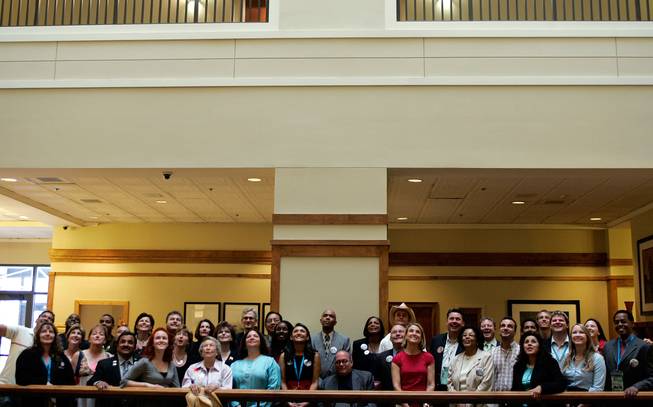 Our very own Nevada delegation and staff took some time out for a group portrait Wednesday morning in the atrium of the Courtyard Marriott in downtown Denver. Their photographer (not me) was shooting photos from a few floors above for a bird's-eye view, so I took the ground floor view. -- Leila Navidi