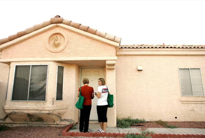 Breeden, left, and daughter Jennifer Breeden go door to door in Breeden's September 2008 effort to unseat GOP Sen. Joe Heck. The Democrat has yet to publicly share her ideas for solving the state's problems.

