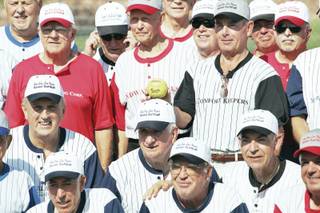 Members of the Sun City Summerlin senior softball team pose for a group photo before the team's opening game on Sept. 15.
