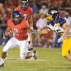 Bishop Gorman graduate Keola Antolin, left, returns to his hometown for the 17th Las Vegas Bowl. Antolin's Arizona Wildcats will face the BYU Cougars on Saturday at Sam Boyd Stadium.
