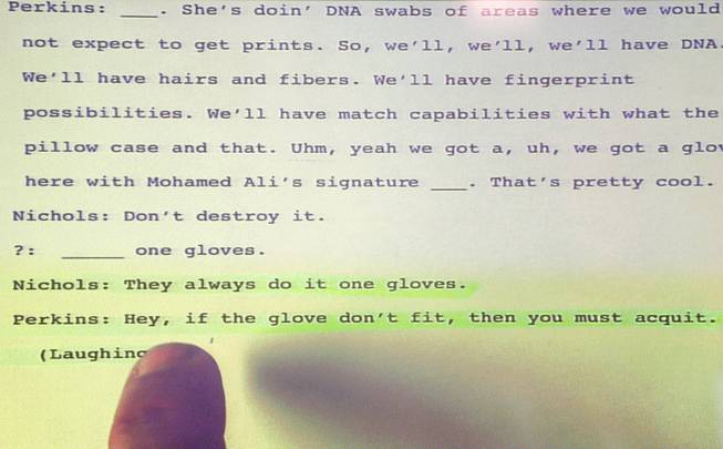 O.J. Simpson attorney Gabriel Grasso points to a transcript of an audio recording identifying a statement by Las Vegas Metropolitan Police Department crime scene analyst Michael Perkins during Simpson's trial at the Clark County Regional Justice Center on Friday, Sept. 26, 2008, in Las Vegas. The line reads "Hey, if the glove don't fit, then you must acquit."
