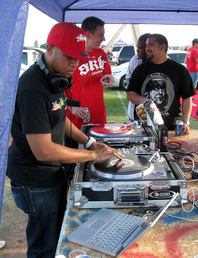DJ Green kept the crowd on its toes during the nearly four-hour tailgate session before the Battle for Nevada began Saturday night.
