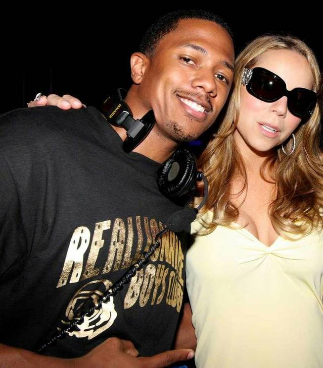 DJ Nick Cannon and new wife Mariah Carey.