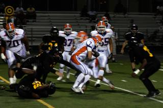 Bishop Gorman quarterback John Therrell (7) runs with the ball during the first quarter of the Gaels' game at Clark. 