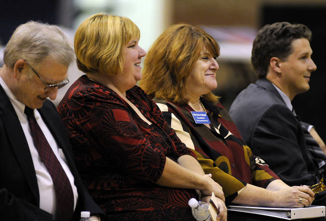 From left,  school board candidates Dr. Edward Goldman and Deanna Wright, and state Assembly District 21 candidates Ellen Spiegel and Jonathan Ozark smile after a light comment from Dr. Joe Heck (not pictured) during the Oct. 7 forum at Bob Miller Middle School.