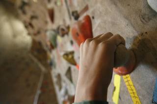 A man climbs at the Red Rock Climbing Center on Oct. 8.