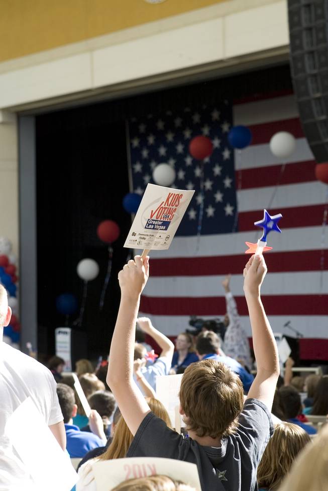Dillon Meeks, an eighth-grader at Mannion Middle School, reacts excitedly for the start of the KidsVention event at the Henderson Pavilion on Oct. 10. Meeks, along with 2,500 other students from around Clark County participated in discussions about the issues that affect them. 