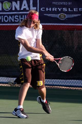 Tommy Lettero of Bonanza lines up a backhand against Fernando Sunago of Palo Verde during the Sunset regional tournament at Darling Tennis Center on Friday.