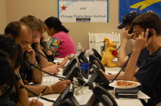 Volunteers at the McCain-Palin headquarters in Henderson make phone calls to local constituents Tuesday afternoon. 