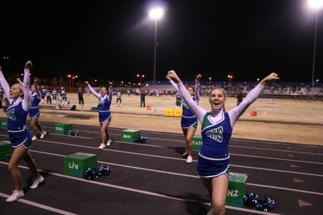 Green Valley cheerleaders keep up the pep during Friday's game. ...