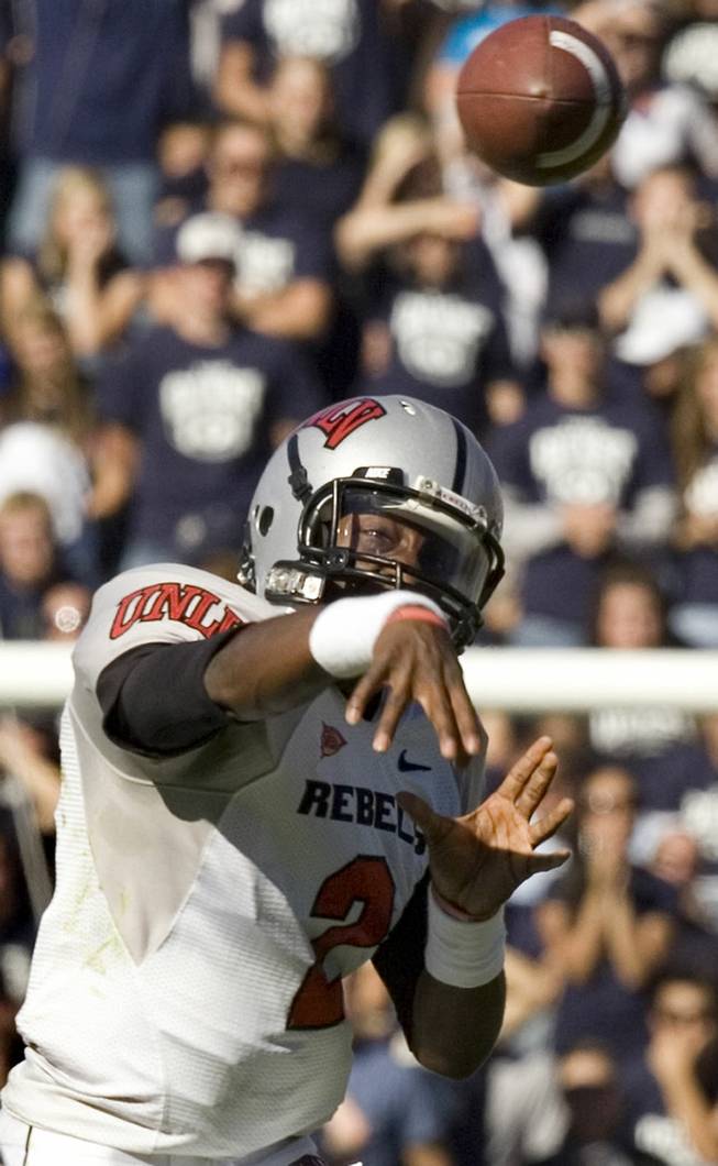 UNLV quarterback Omar Clayton (2) passes against BYU during the fourth quarter. Clayton threw for 321 yards including one touchdown. 