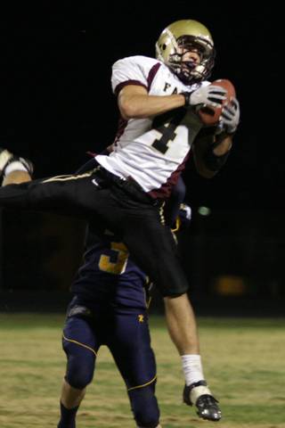 Faith Lutheran wide receiver Don Pearson, shown making a reception against Boulder City in 2009, has a scholarship offer from Stanford and interest from several other schools.
