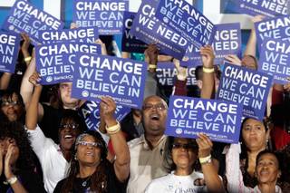 The crowd cheers as Michelle Obama, wife of Democratic presidential nominee Sen. Barack Obama, speaks at a rally at Doolittle Park in Las Vegas Monday evening.