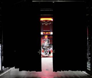 A sliver of Jerry Tarkanian court is visible from behind a curtain to the loading dock area of the Thomas & Mack Center.