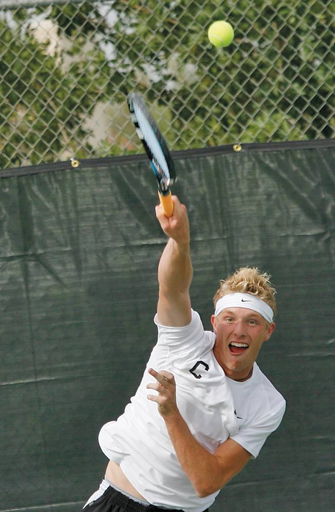 Palo Verde senior Brandon Parker returns a ball during a match against the Meadows' Ryan Wells on Oct. 2.

