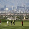 With the Las Vegas skyline as a backdrop, celebrities and professional golfers play on the green during the Danny Gans' Partee Fore Kids Celebrity Pro-Am at DragonRidge Country Club on Monday. With the Las Vegas skyline as a backdrop, celebrities and professional golfers play on the green during the Danny Gans' Partee Fore Kids Celebrity Pro-Am at DragonRidge Country Club on Monday.