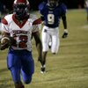 Valley's Kerwyn Williams takes the ball down the sideline for a large gain at Basic High on Nov. 7.