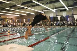 Boulder City-Henderson Heatwave's Hannah Herbst, of Bob Miller Middle School, dives from the platform while competing in the 500 freestyle during the state championships at Desert Breeze Pool on Saturday.