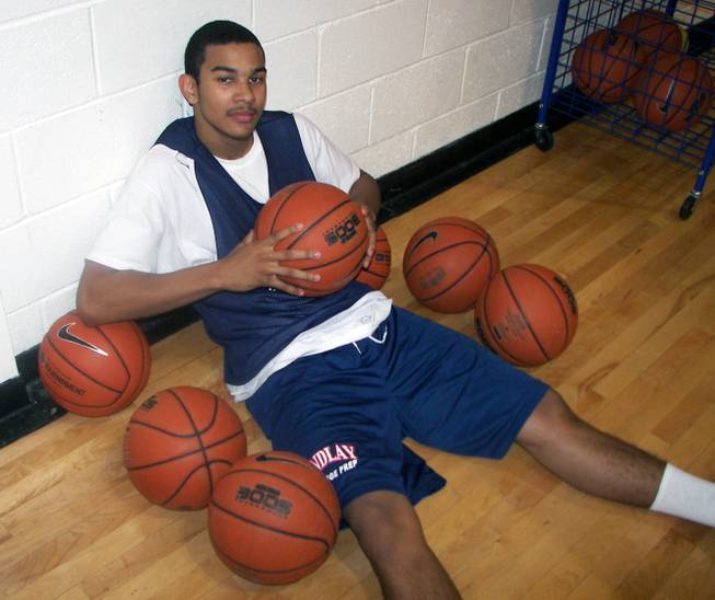 New Findlay College Prep point guard Cory Joseph poses after a recent practice. The junior from suburban Toronto hopes to guide the third-year Pilots, who went 32-1 last season, to the national title that eluded them one year ago.